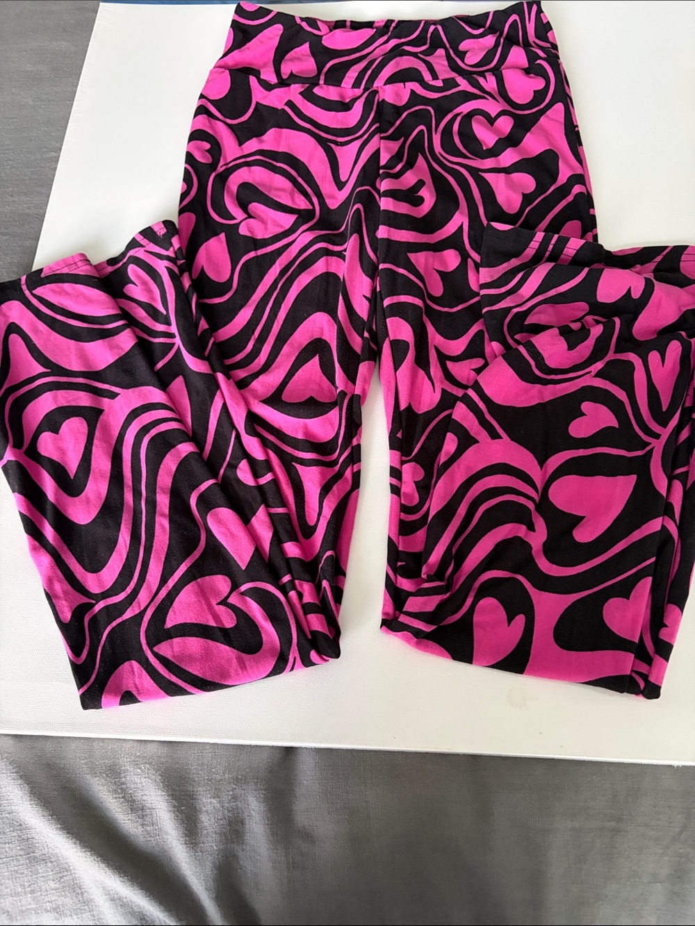 No Boundaries Pink and Black Flare Leggings with Heart Swirl Print